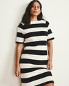 Woman wearing Belle Breton Stripe Jersey Dress - Ecru/Black Rugby Stripe from Universal Standard