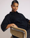 Woman wearing Dora Cotton Poplin Blouse - Black from Universal Standard