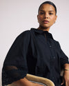 Woman wearing Dora Cotton Poplin Blouse - Black from Universal Standard