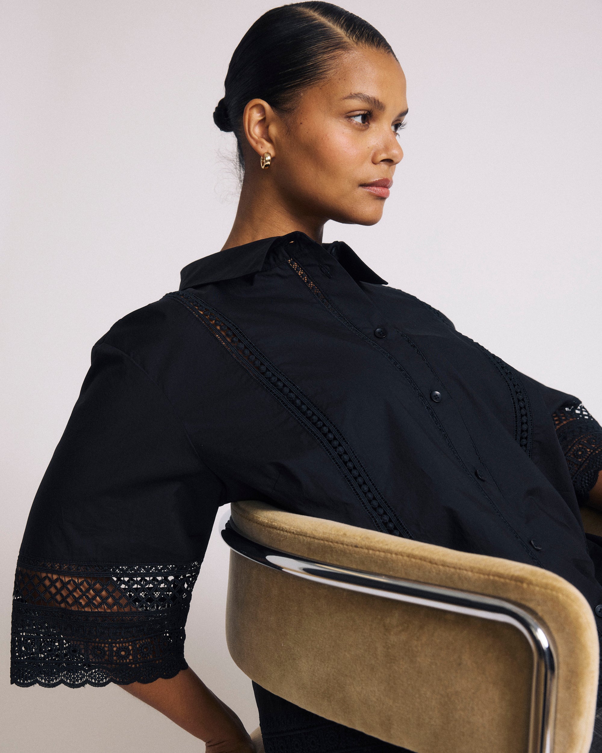 Woman wearing Dora Cotton Poplin Blouse - Black from Universal Standard