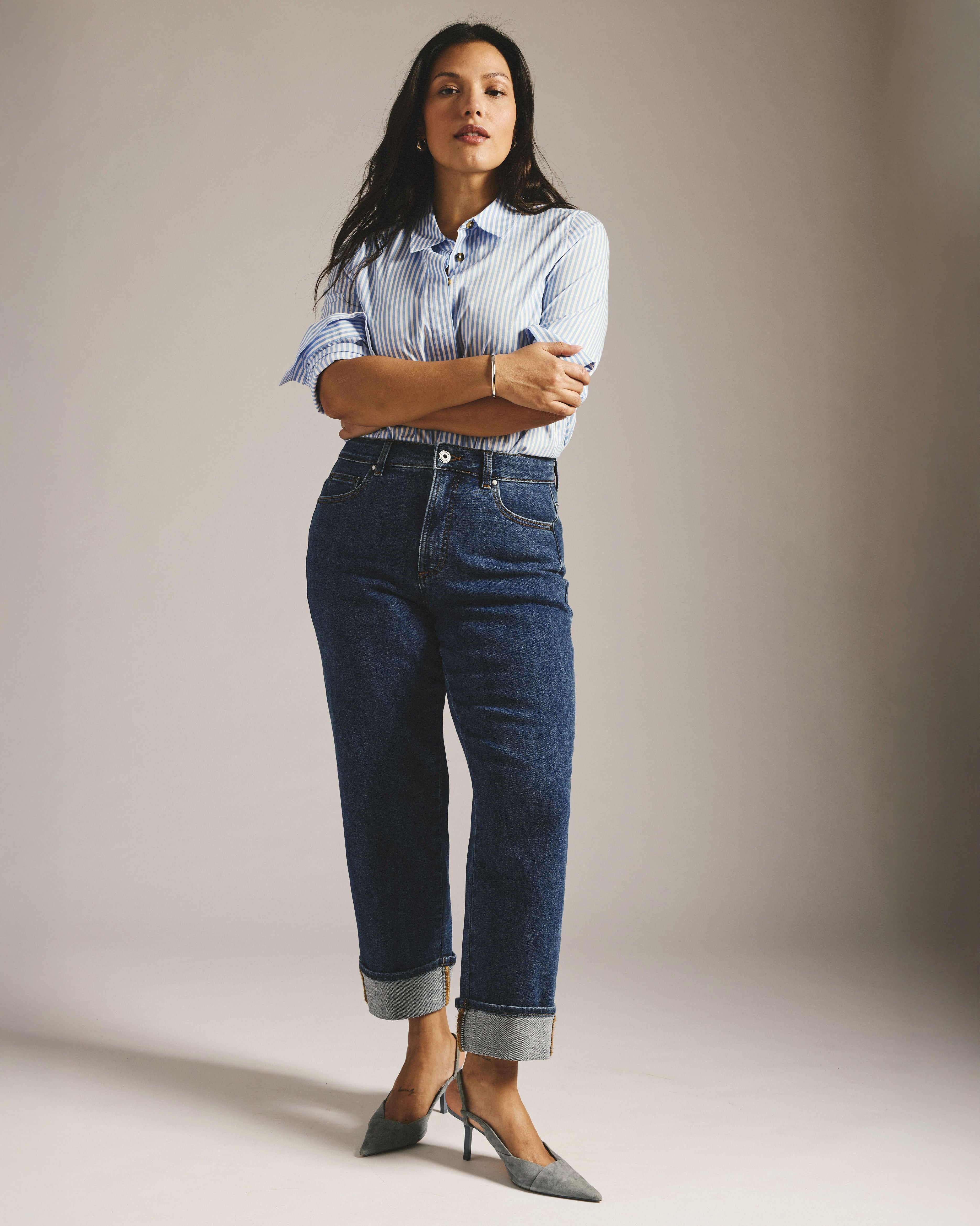 Woman wearing Stevie High Rise Cuffed Straight Leg Jeans - Odeon Blue from Universal Standard