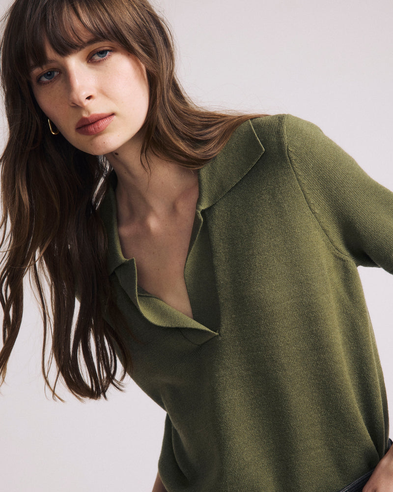 Woman wearing Savvy Fine Knit Short Sleeve Polo Sweater - Olive Leaf from Universal Standard