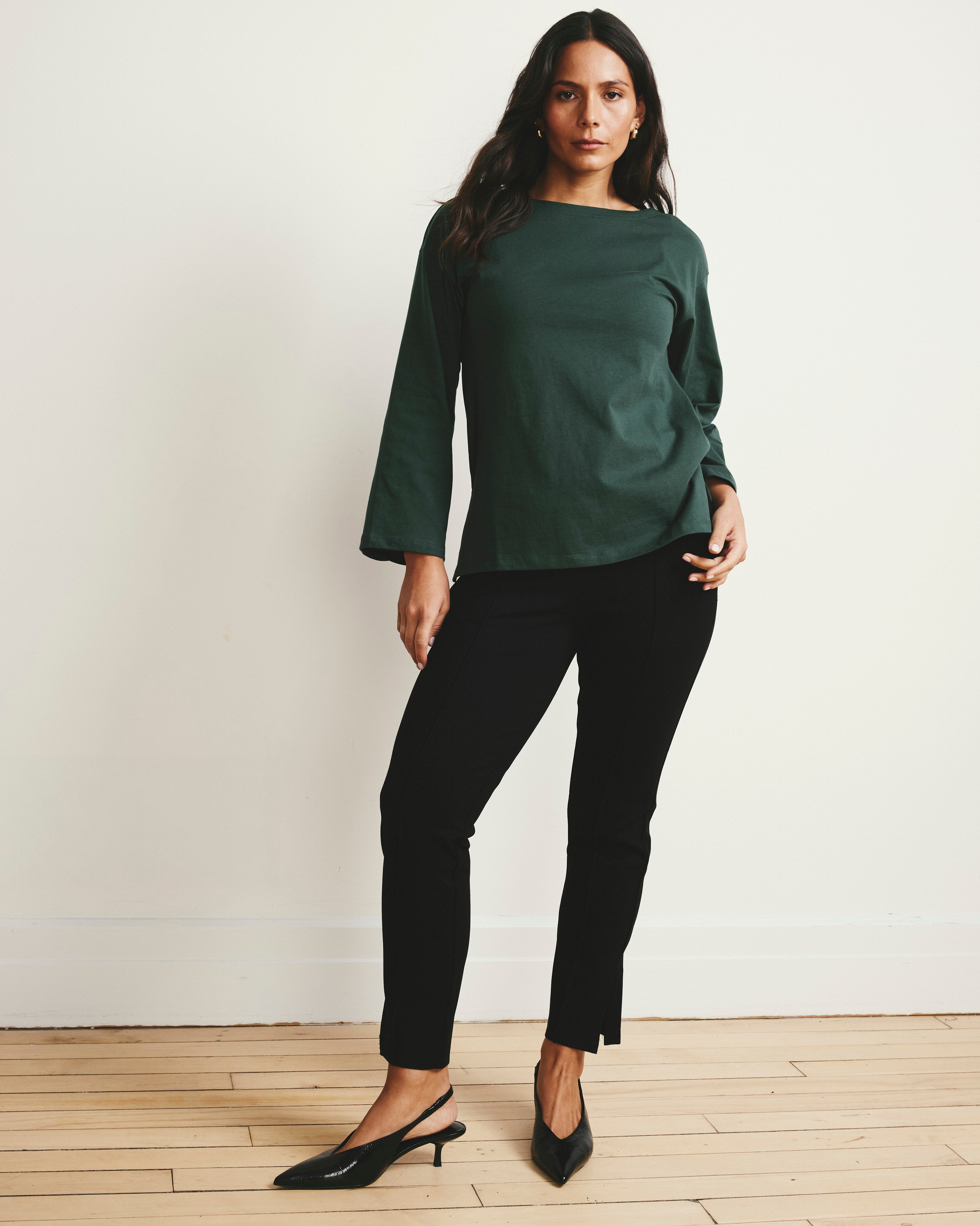 Woman wearing Skinny Pintuck Ponte Pants 28 Inch - Black from Universal Standard