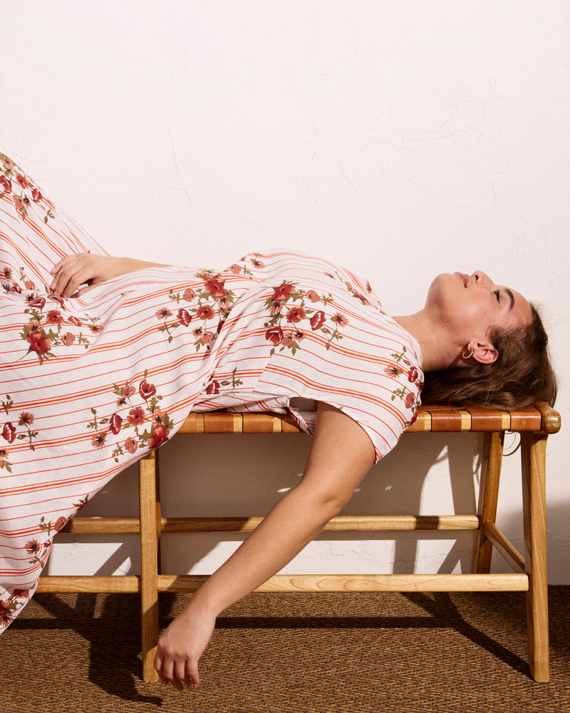 Woman wearing Louvre Bow Back Linen Dress - Wild Flower Bouquet Print on Stripes from Universal Standard