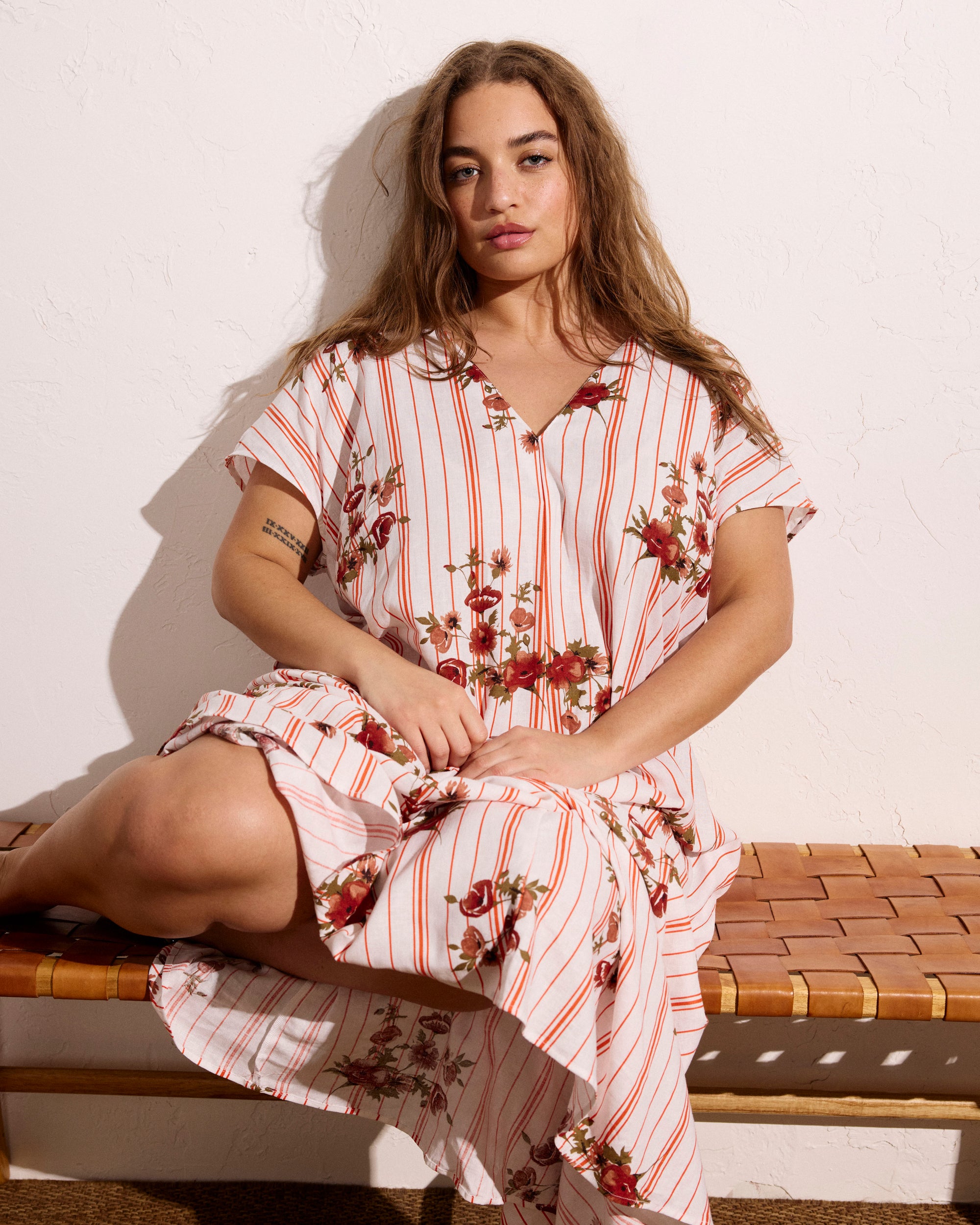 Woman wearing Louvre Bow Back Linen Dress - Wild Flower Bouquet Print on Stripes from Universal Standard
