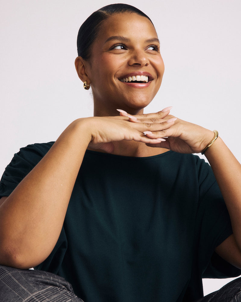 Woman wearing Helena Divine Jersey Gathered Tee - Forest Green from Universal Standard