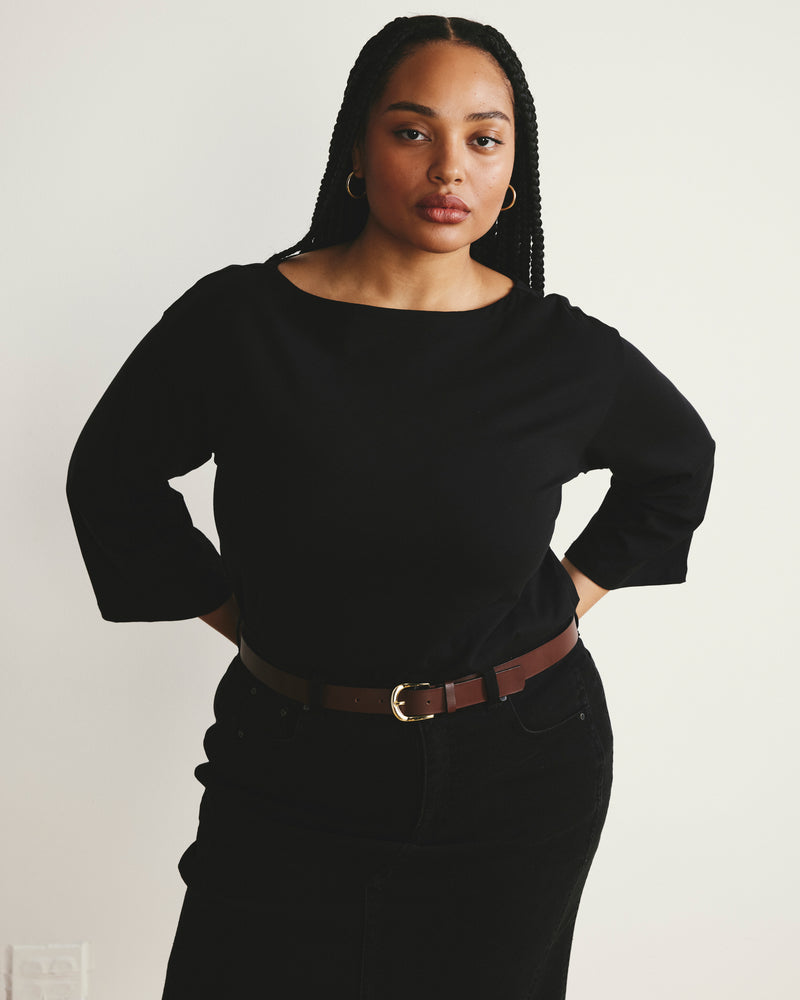 Woman wearing Montauk Breton Stripe Bell Sleeve Top - Solid Black from Universal Standard