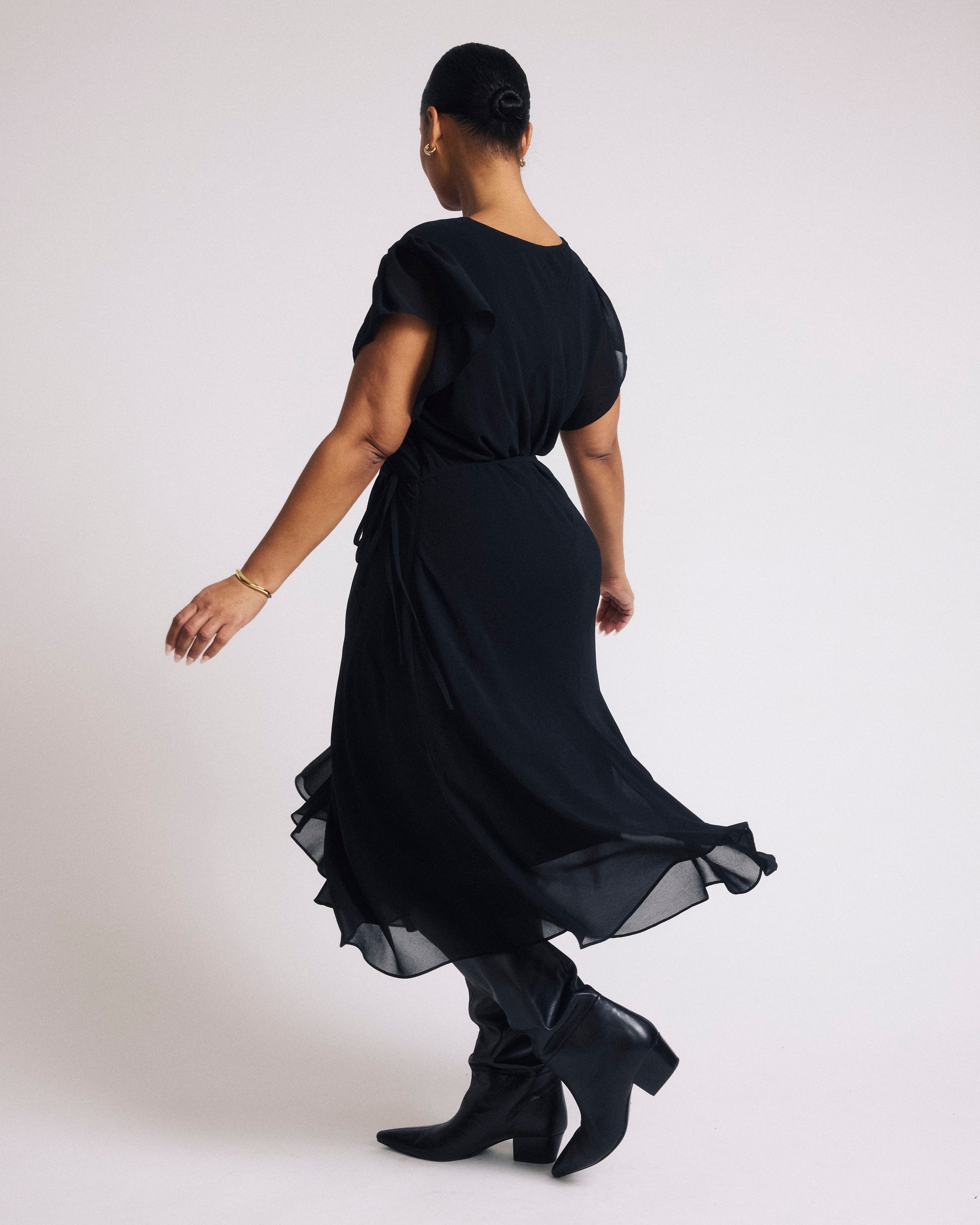 Woman wearing Seville Chiffon Dress - Black from Universal Standard