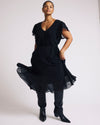 Woman wearing Seville Chiffon Dress - Black from Universal Standard