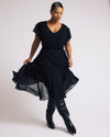 Woman wearing Seville Chiffon Dress - Black from Universal Standard