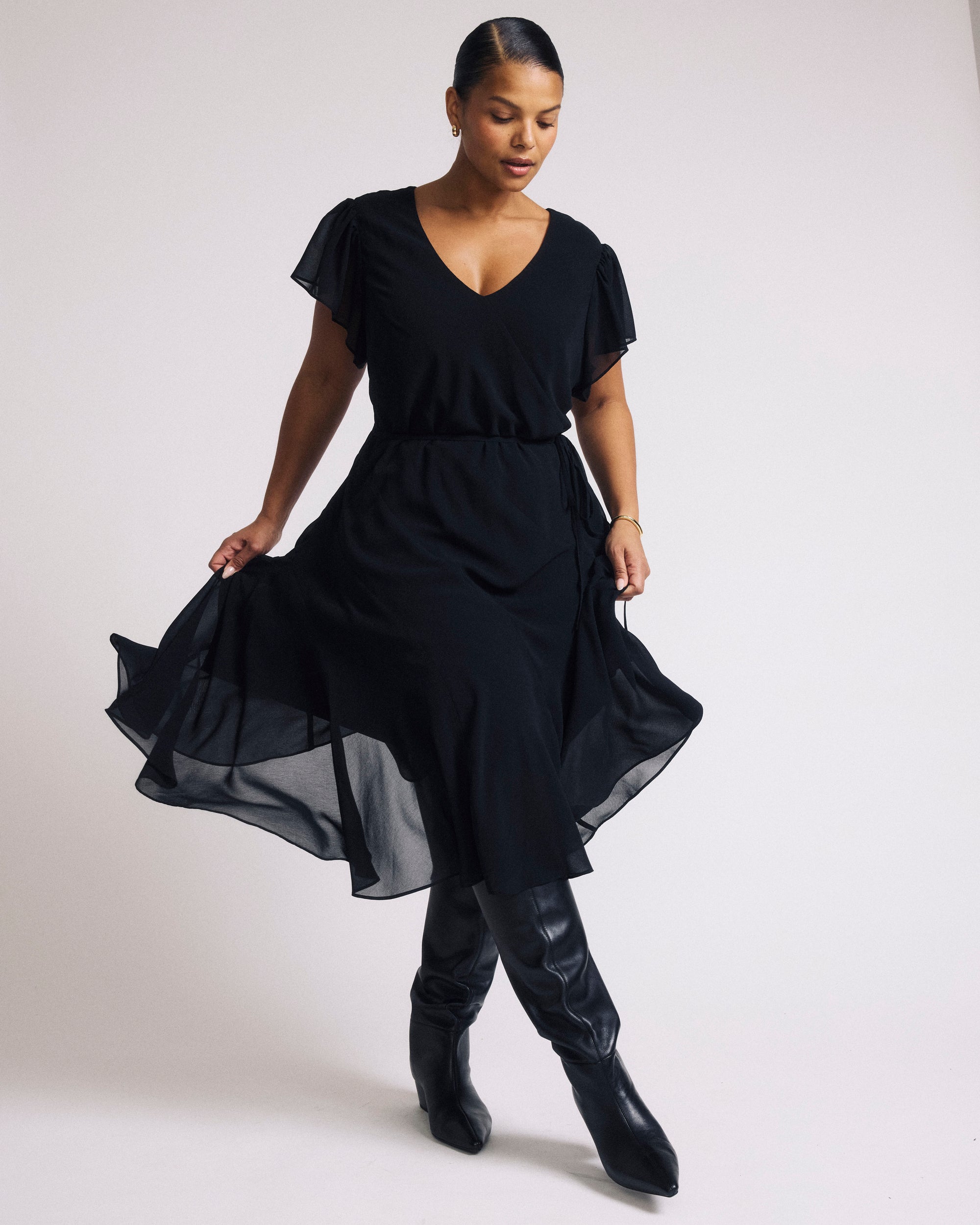 Woman wearing Seville Chiffon Dress - Black from Universal Standard