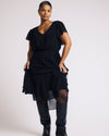 Woman wearing Seville Chiffon Dress - Black from Universal Standard