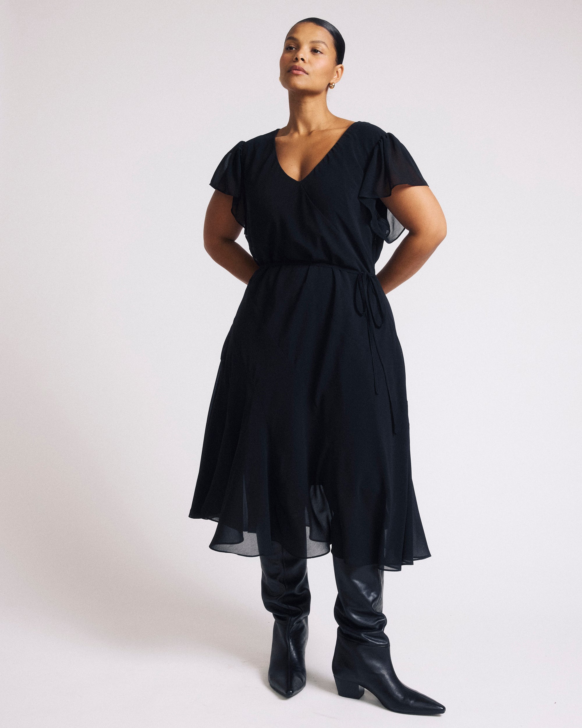Woman wearing Seville Chiffon Dress - Black from Universal Standard
