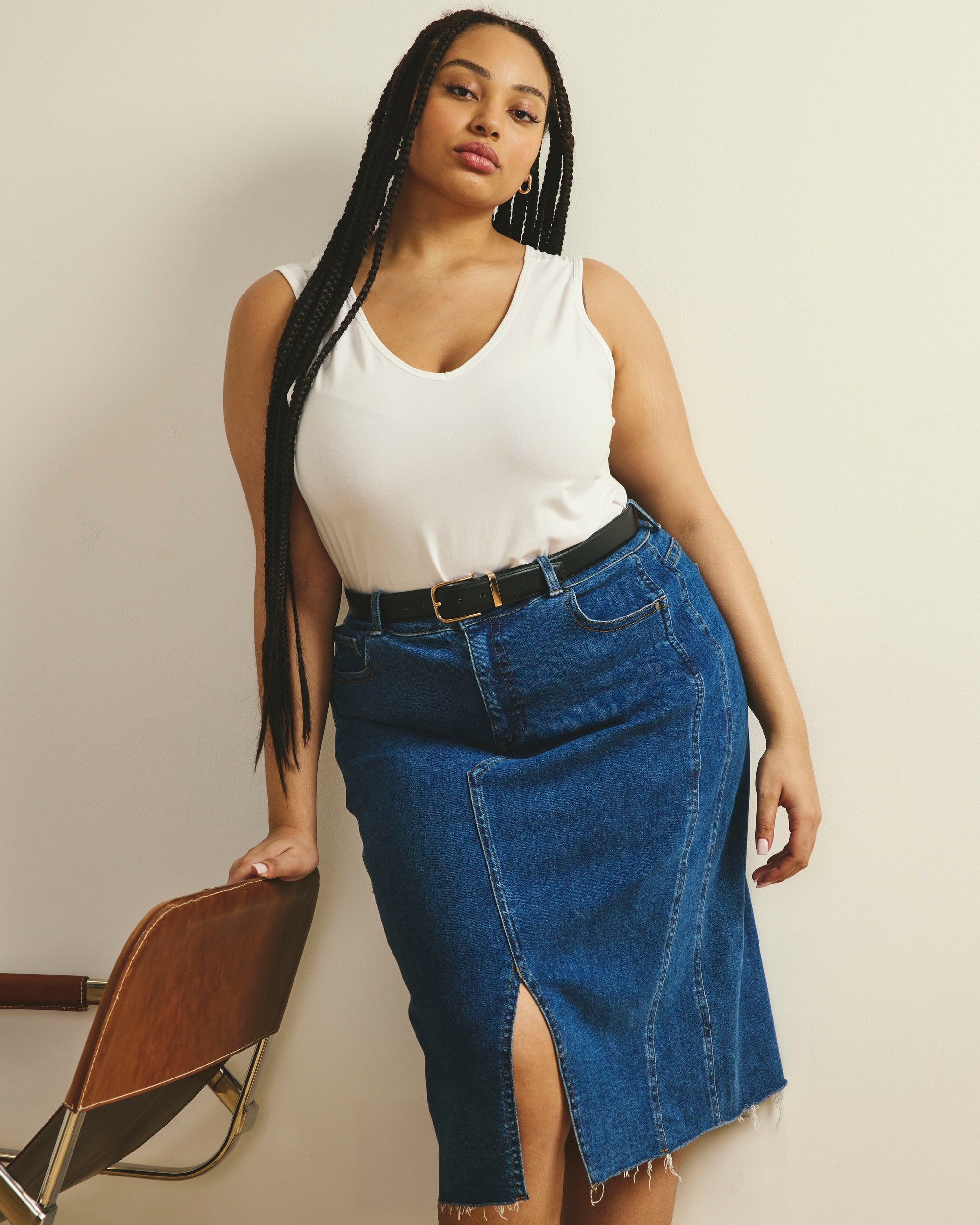 Woman wearing Double V Tank - White from Universal Standard