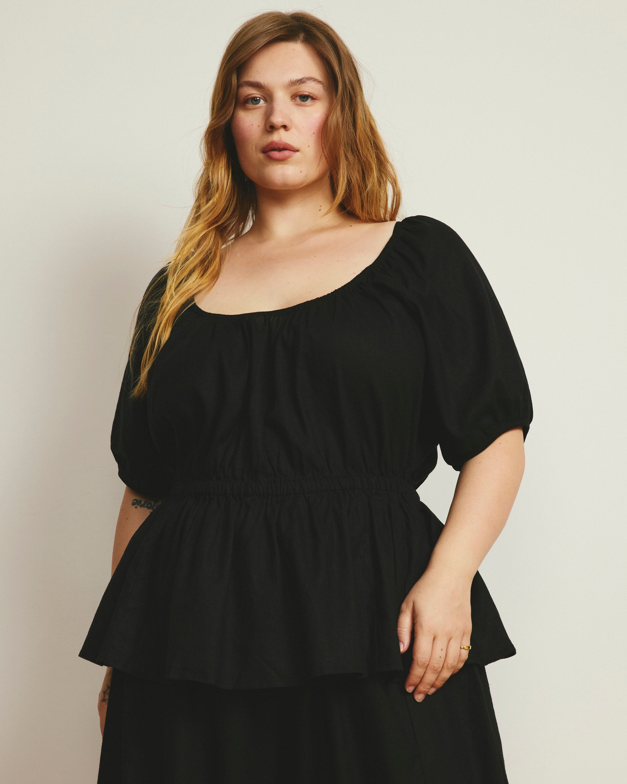 Andrea Peplum Linen Blend Top