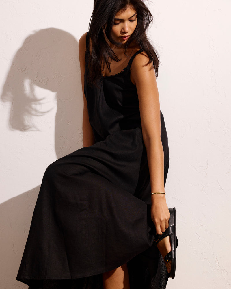 Woman wearing Kite Linen Dress - Black from Universal Standard