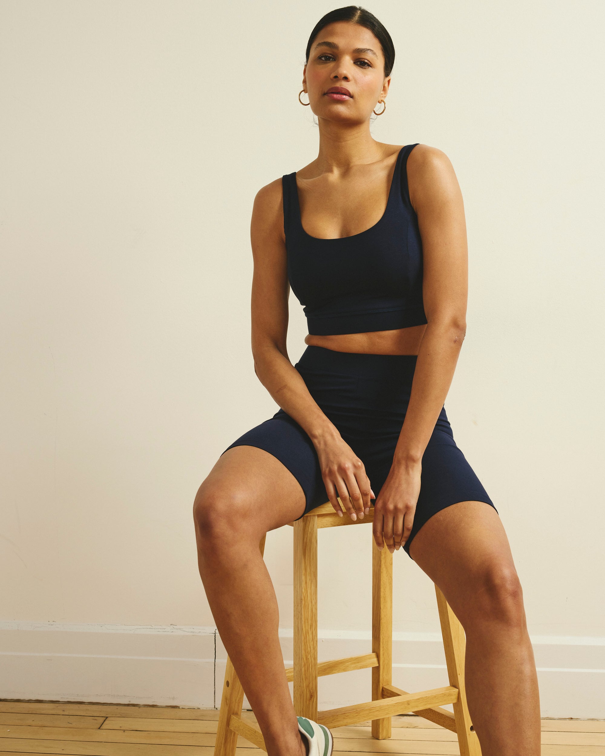 Woman wearing Roya Bike Shorts - Midnight from Universal Standard