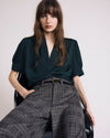 Woman wearing Beatrice Soft Satin Top - Forest Green from Universal Standard