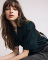 Woman wearing Beatrice Soft Satin Top - Forest Green from Universal Standard