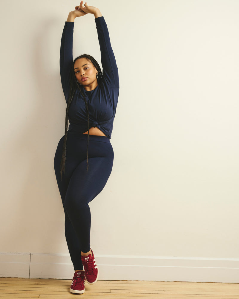 Woman wearing Roya Leggings 27 Inch - Midnight from Universal Standard
