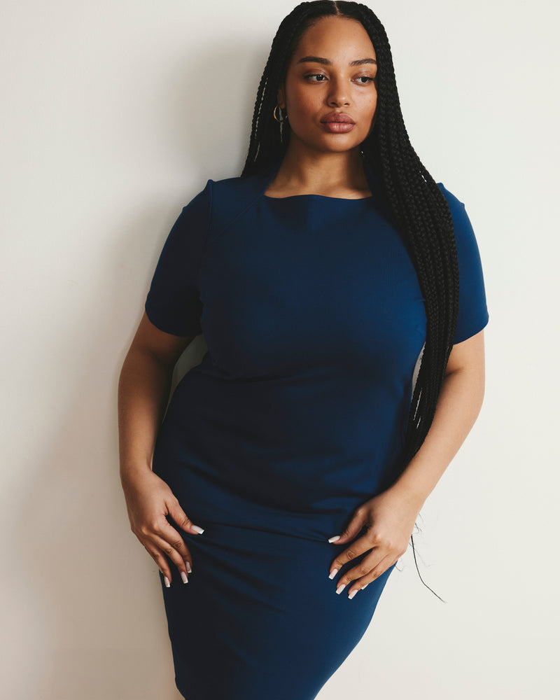 Woman wearing Envelope Neck Ponte Dress - Deep Teal from Universal Standard