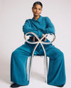 Woman wearing Palais Cooling Cupro Wide Leg Pant - Blue Beetle from Universal Standard