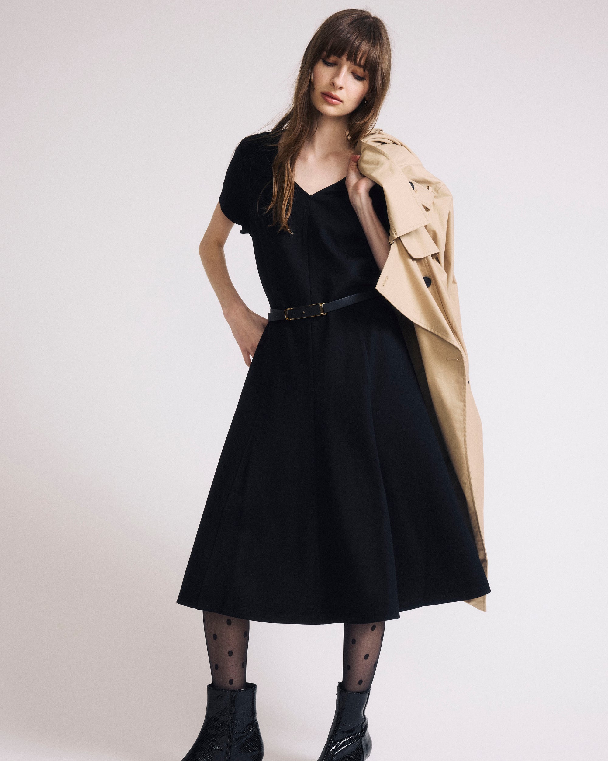 Woman wearing Lucinda Ponte Dress - Black from Universal Standard