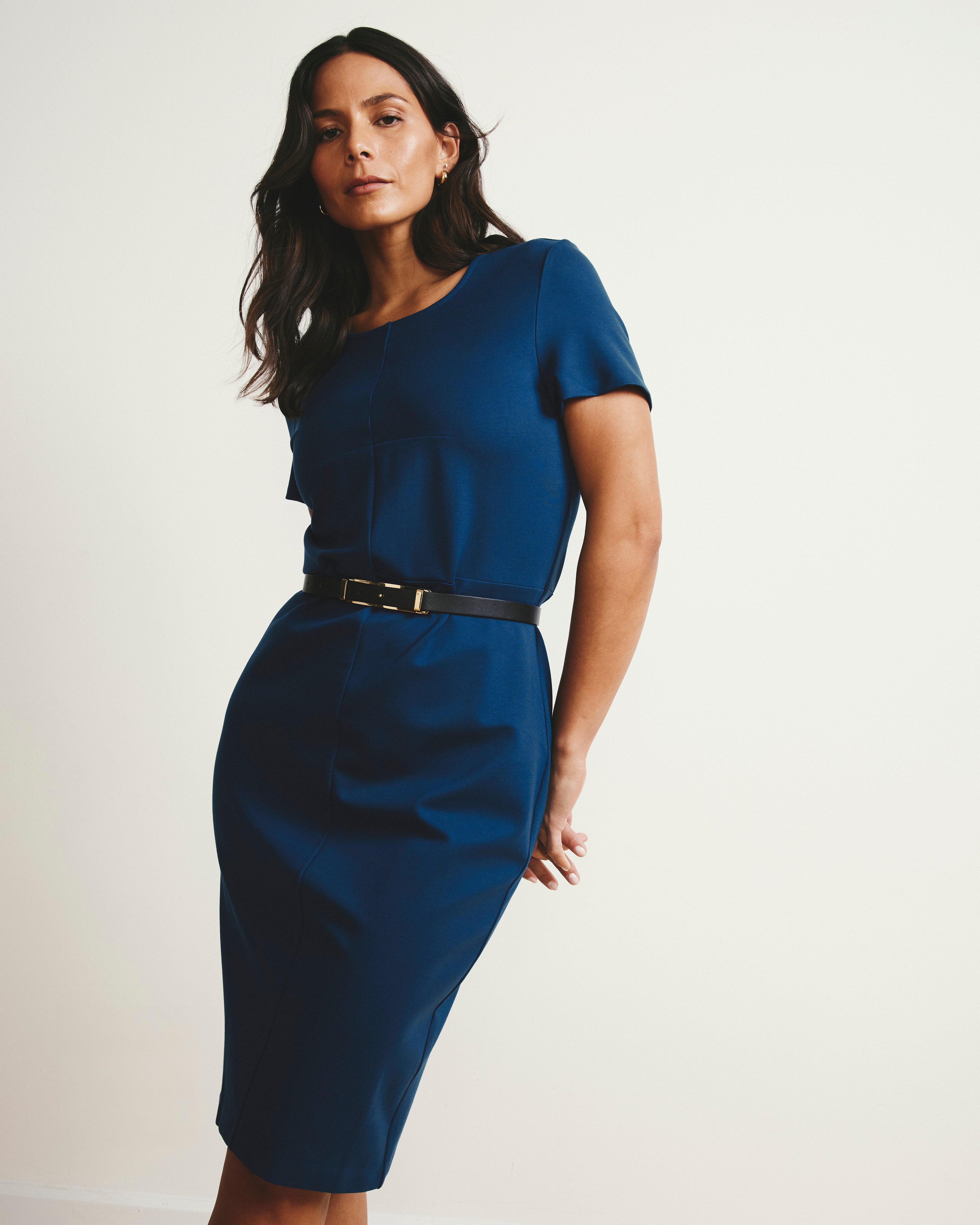 Woman wearing Executive Ponte Dress - Deep Teal from Universal Standard
