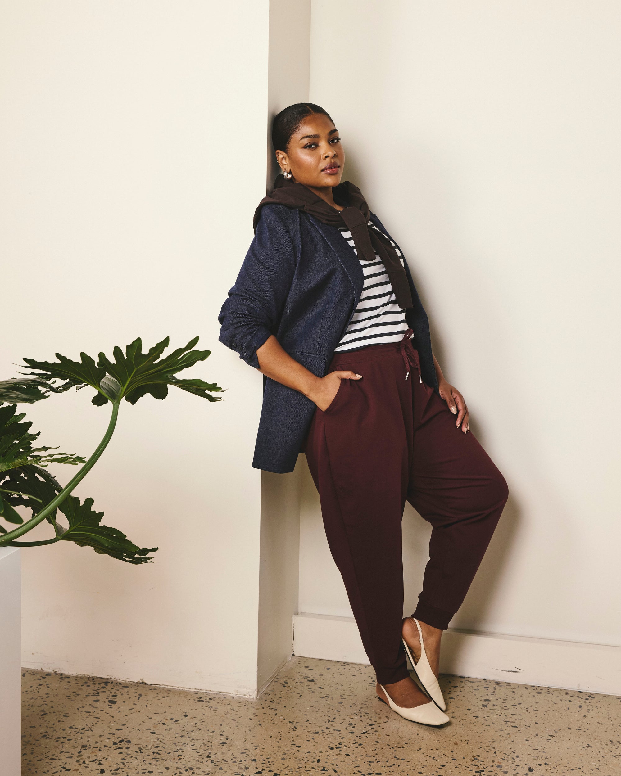 Woman wearing Selma French Terry Jogger - Black Cherry from Universal Standard