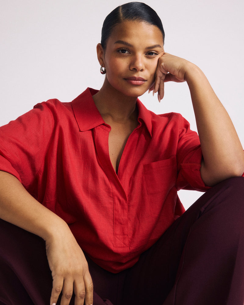 Woman wearing Button Back Linen Polo Shirt - Brilliant Red from Universal Standard