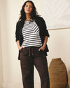 Woman wearing Straight Leg French Terry Sweatpants - Deep Brown from Universal Standard