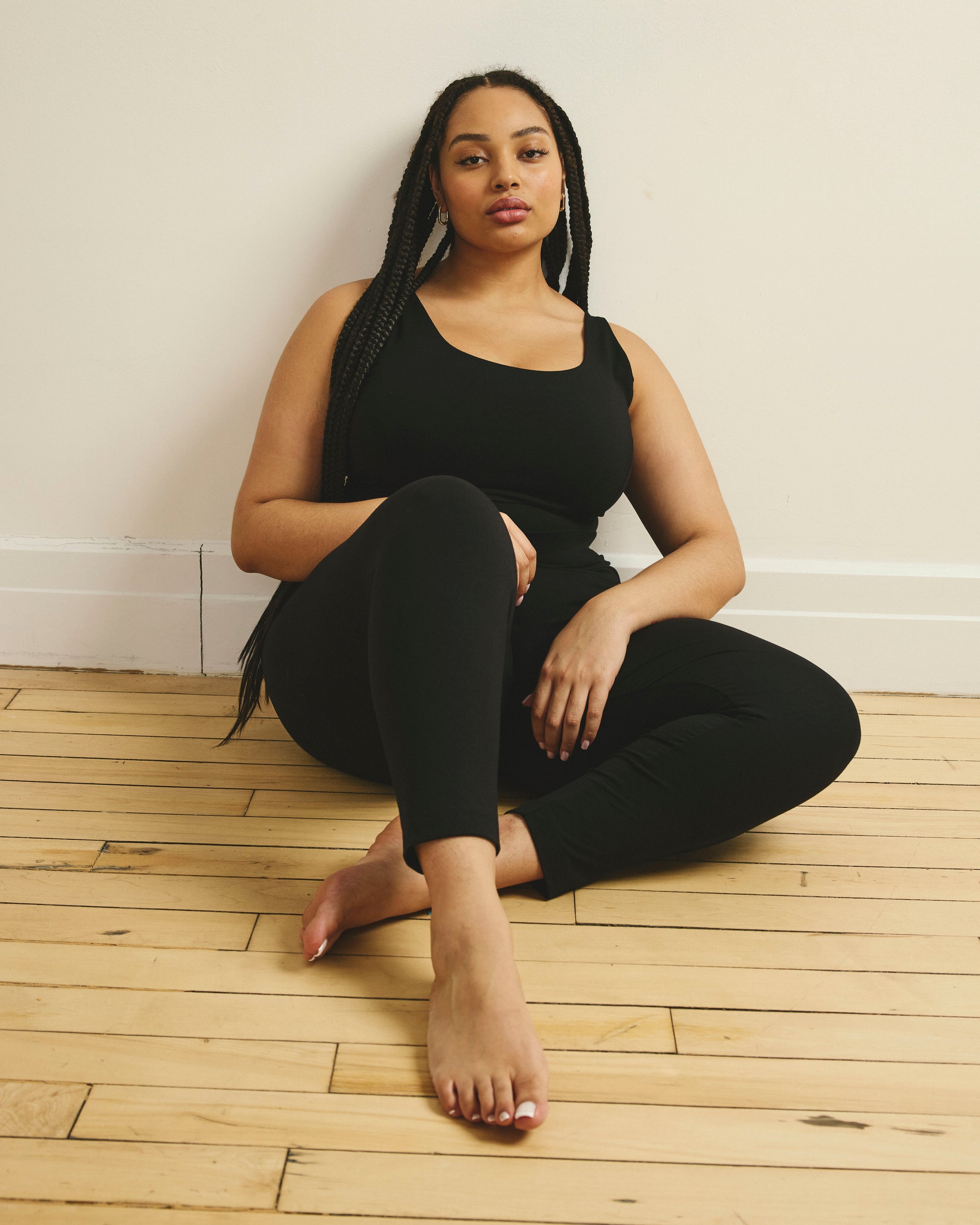 Woman wearing Roya Cropped Leggings 23 Inch - Black from Universal Standard