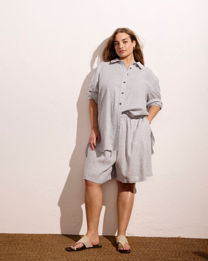 Woman wearing Juniper Linen Easy Pull-On Shorts - Beach Stripe from Universal Standard