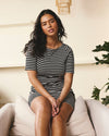 Woman wearing Belle Breton Stripe Jersey Dress - Black/White Stripe from Universal Standard