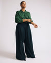 Woman wearing Elbe Popover Stretch Linen Shirt - Green Park from Universal Standard
