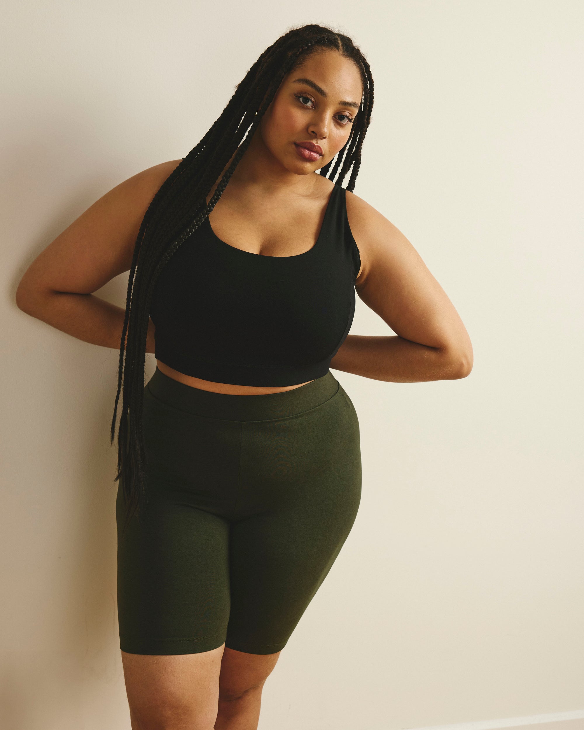 Woman wearing Roya Bike Shorts - Nori from Cart Upsell