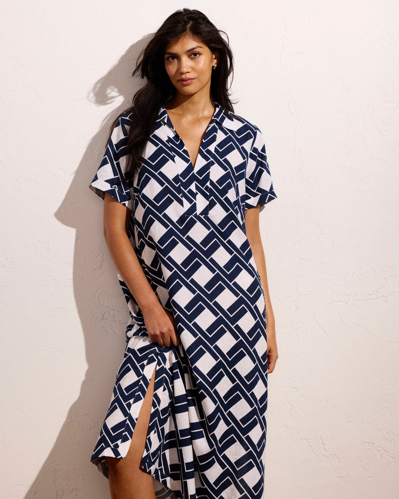 Woman wearing Padma Polo Neck Linen Dress - Geometrica Print from Universal Standard