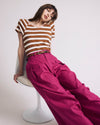 Woman wearing Carey Ribbed Top - Baker Street Stripe from Universal Standard