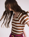 Woman wearing Carey Ribbed Top - Baker Street Stripe from Universal Standard