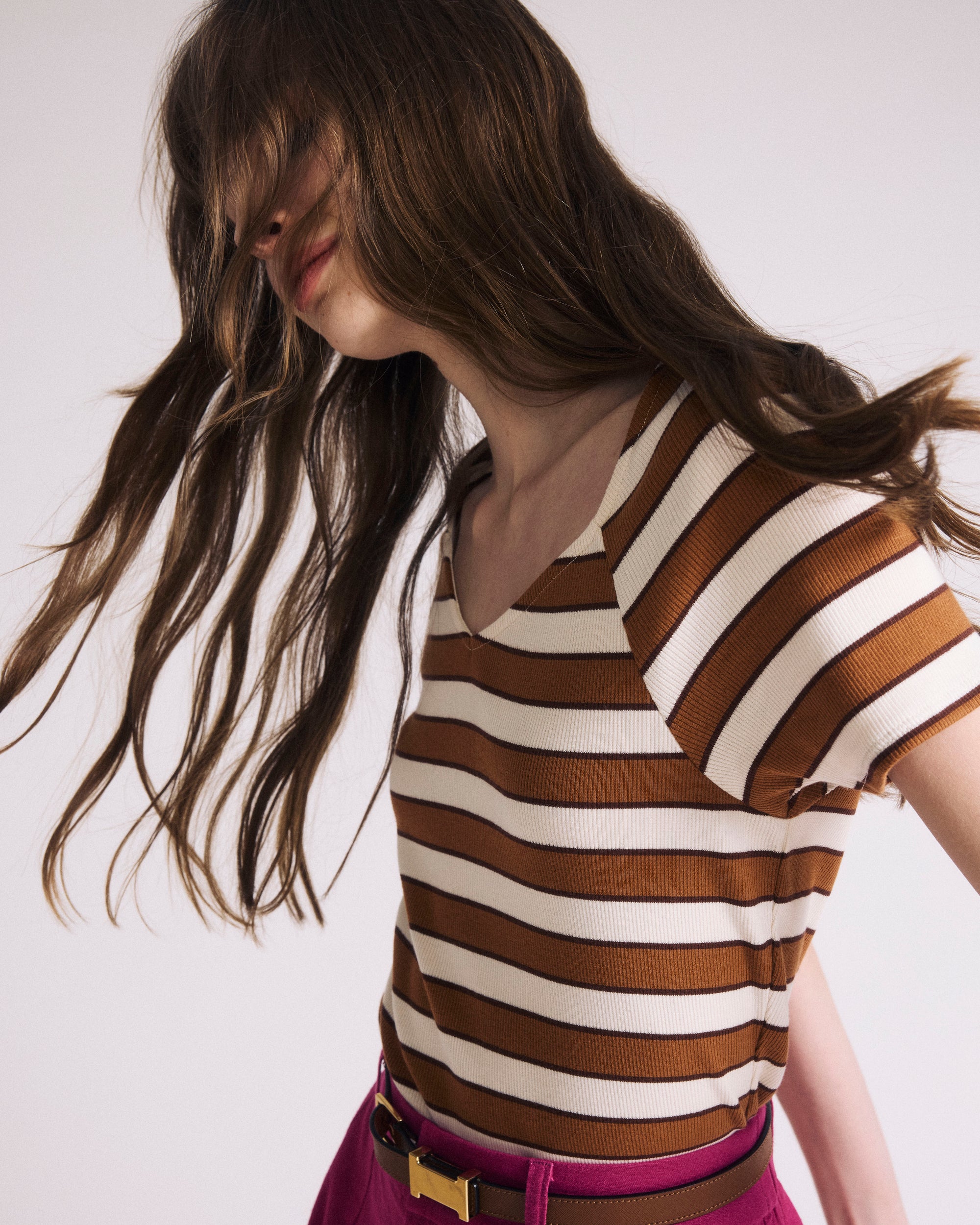 Woman wearing Carey Ribbed Top - Baker Street Stripe from Universal Standard