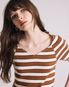 Woman wearing Carey Ribbed Top - Baker Street Stripe from Universal Standard