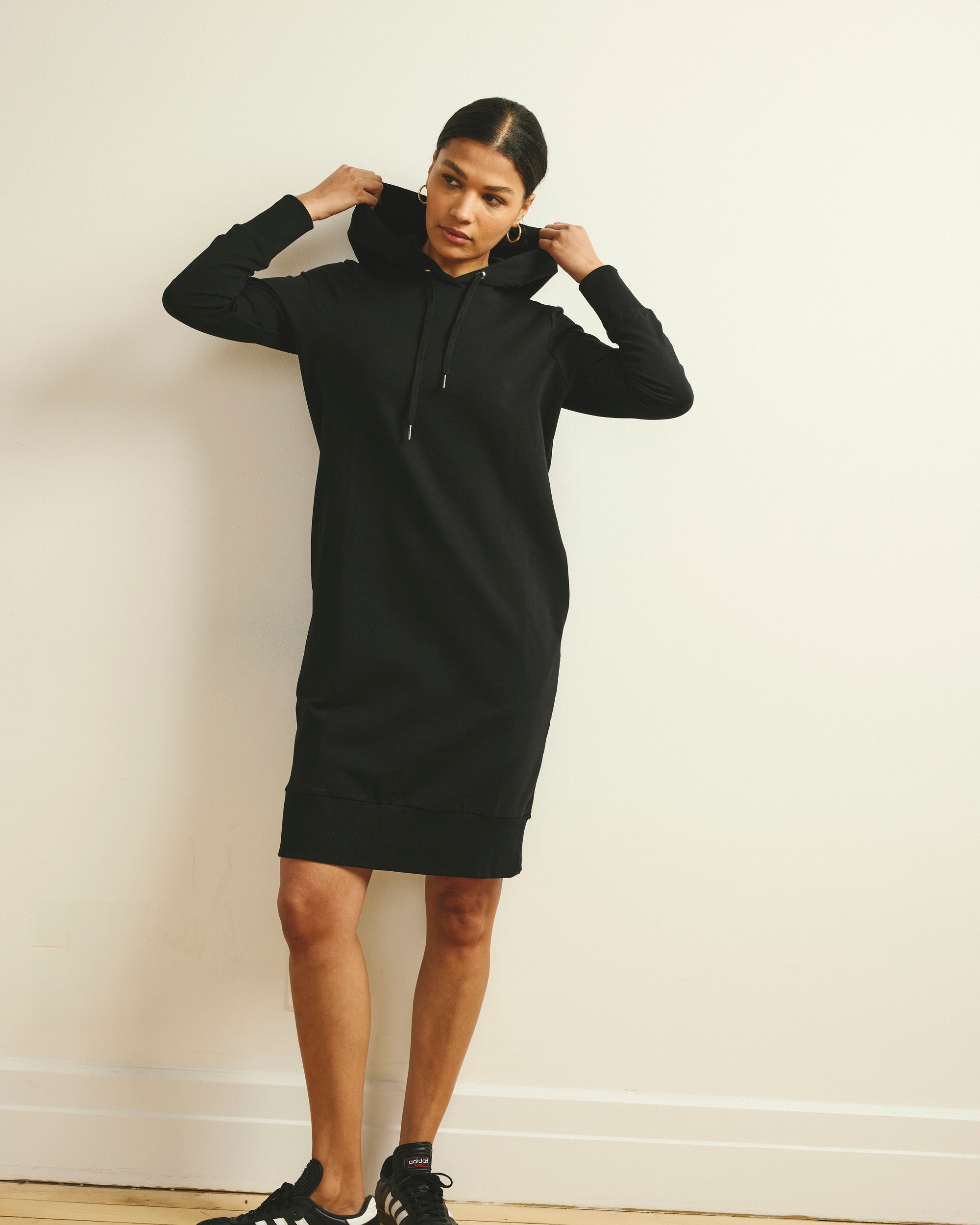 Woman wearing Bree Hooded Sweatshirt Dress - Black from Universal Standard