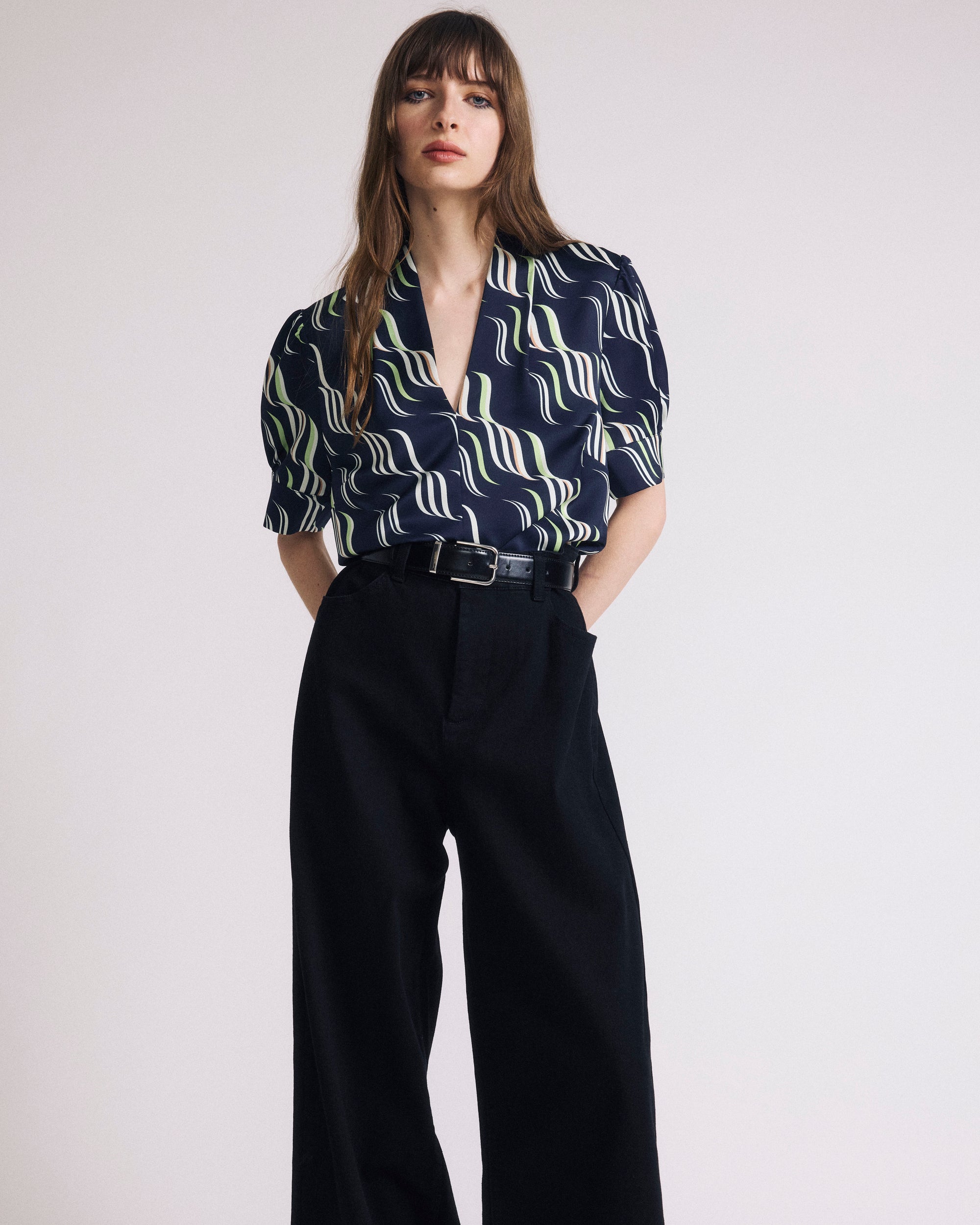 Woman wearing Beatrice Soft Satin Top - Paddington Ribbon Print from Universal Standard