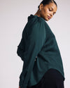 Woman wearing Georgette Satin Cambria Blouse - Forest Green from Universal Standard