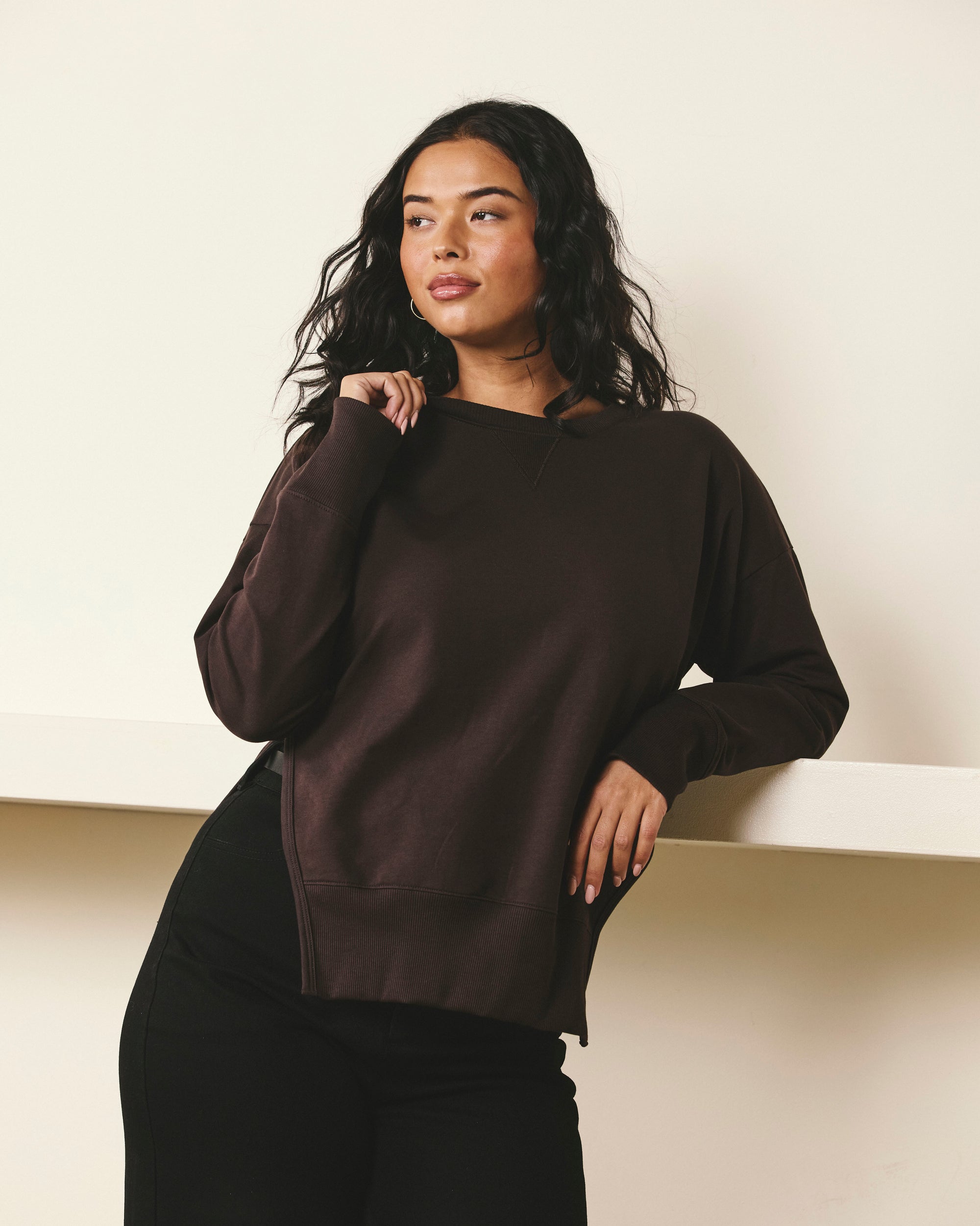 Woman wearing Fiona Side Slit Sweatshirt - Deep Brown from Universal Standard