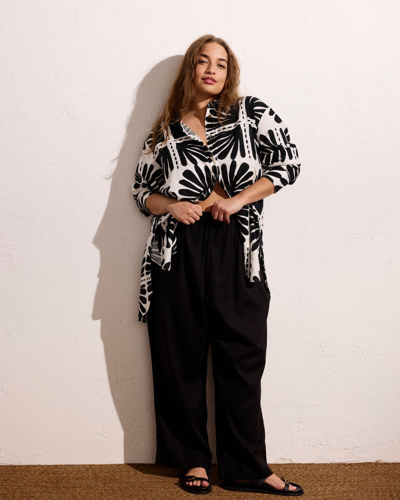 Woman wearing Iris Linen Easy Pull-On Pants - Black from Universal Standard