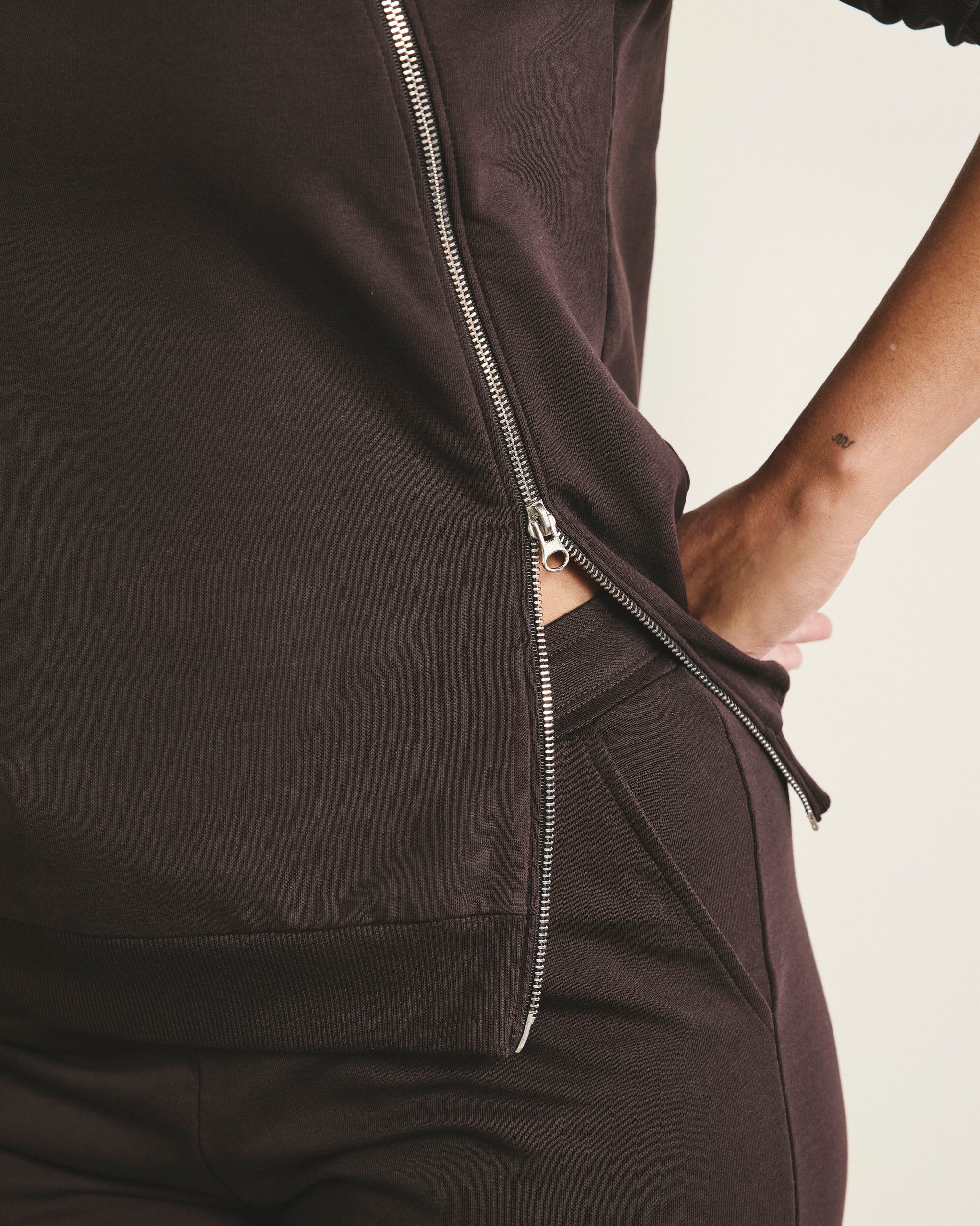 Woman wearing Selma French Terry Jogger - Deep Brown from Universal Standard