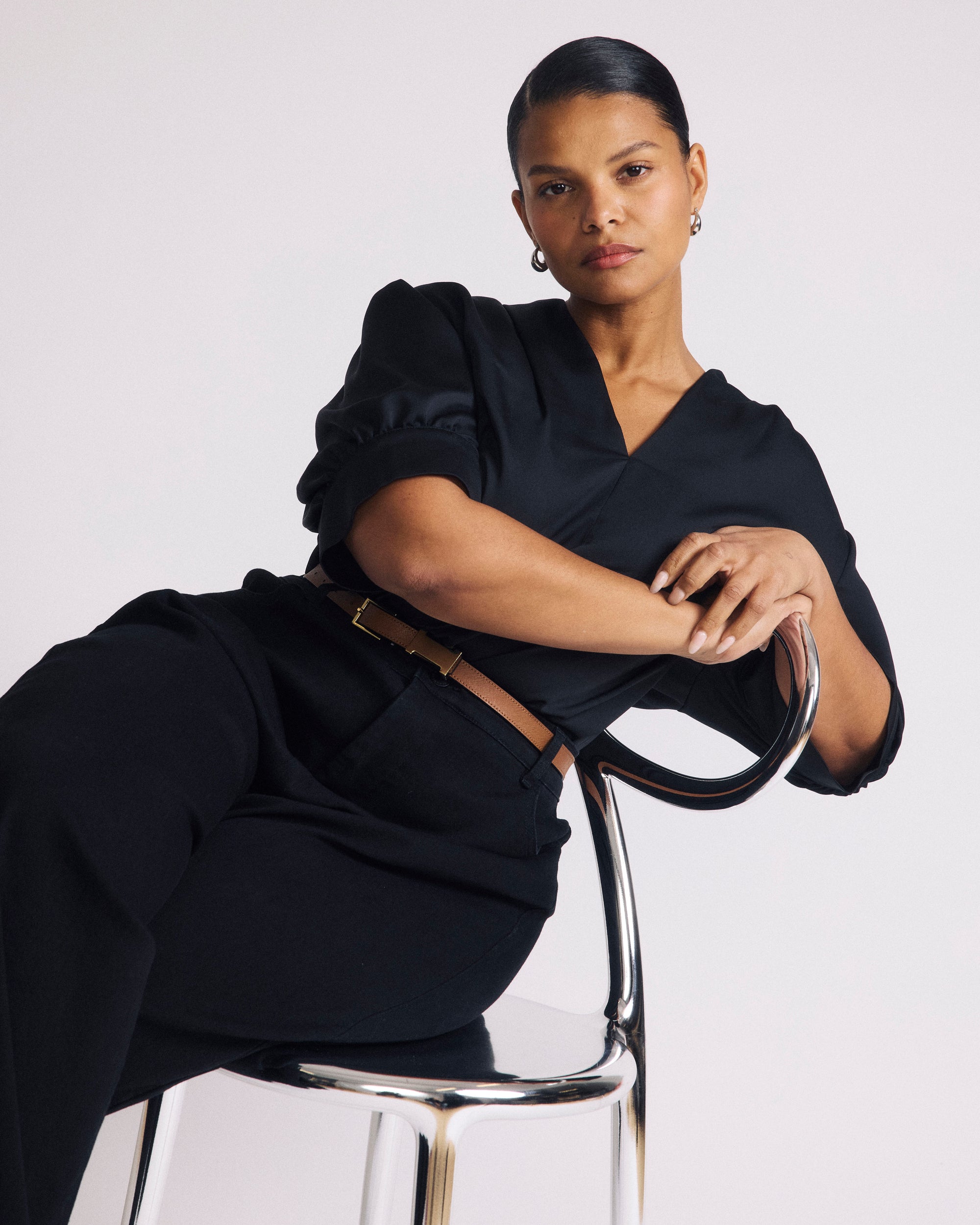 Woman wearing Beatrice Soft Satin Top - Black from Universal Standard