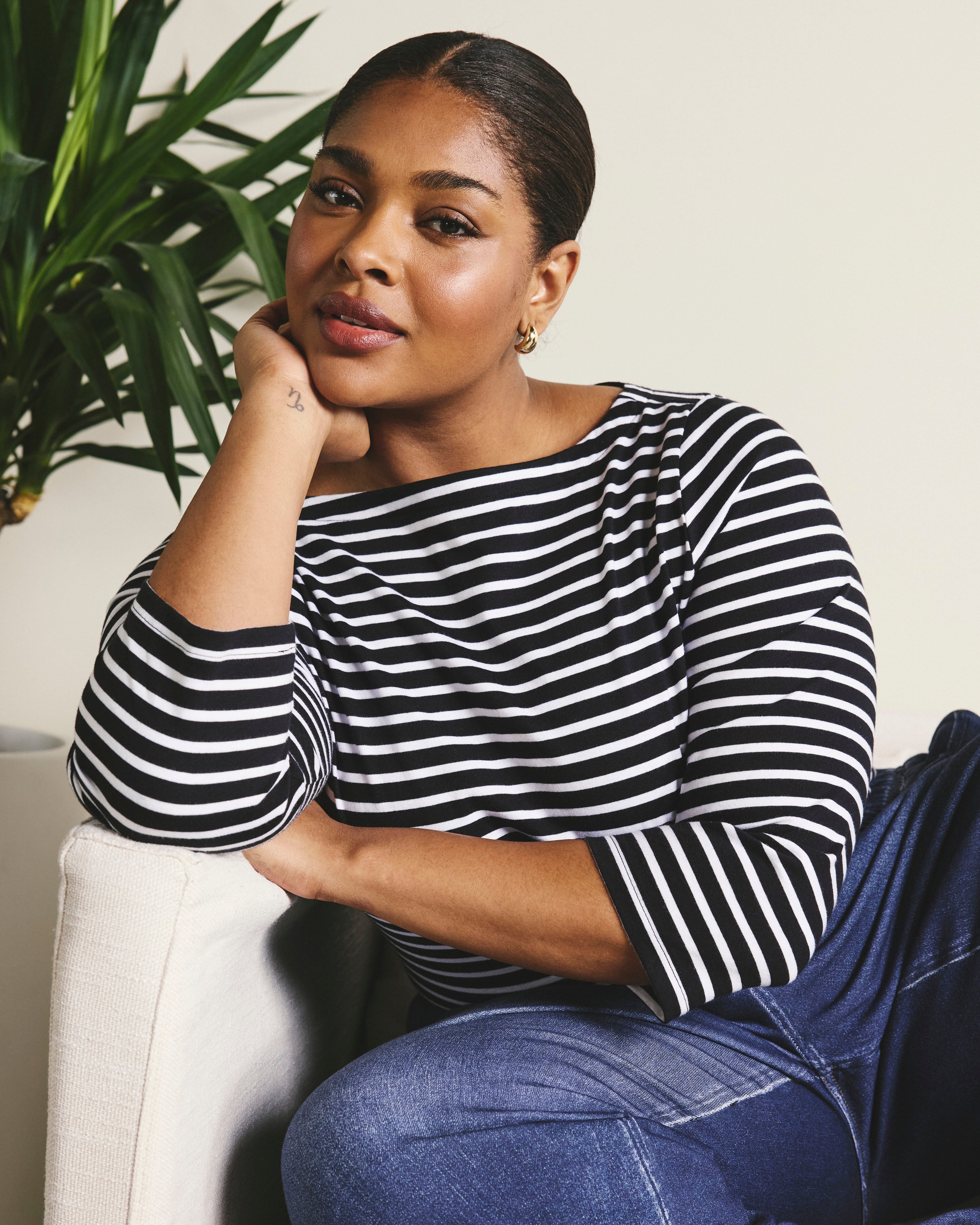 Woman wearing Belle Breton Stripe Jersey Tee - Black/White Stripe from Universal Standard