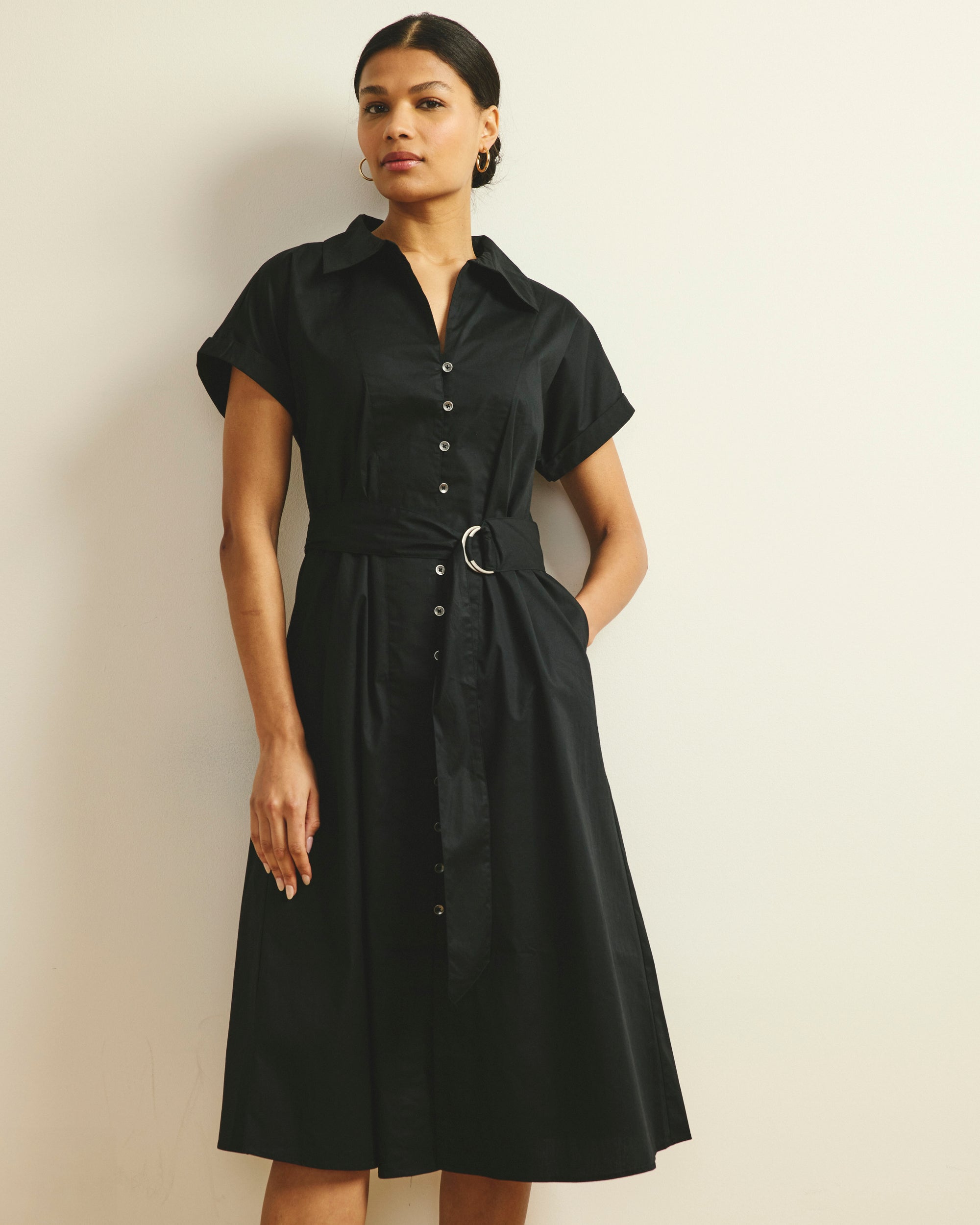 Woman wearing Sandy Stretch Poplin Shirtdress - Black from Universal Standard